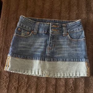 Size 25 Mini Denim Skirt. Lightly worn.